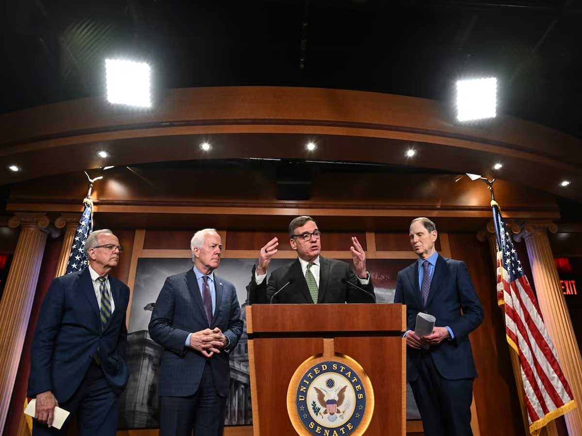 From left, Sens. Jerry Moran (R-Kan.), John Cornyn (R-Tex.), Mark R. Warner (D-Va.) and Ron Wyden (D-Ore.) during a news conference in D.C. last month. 
