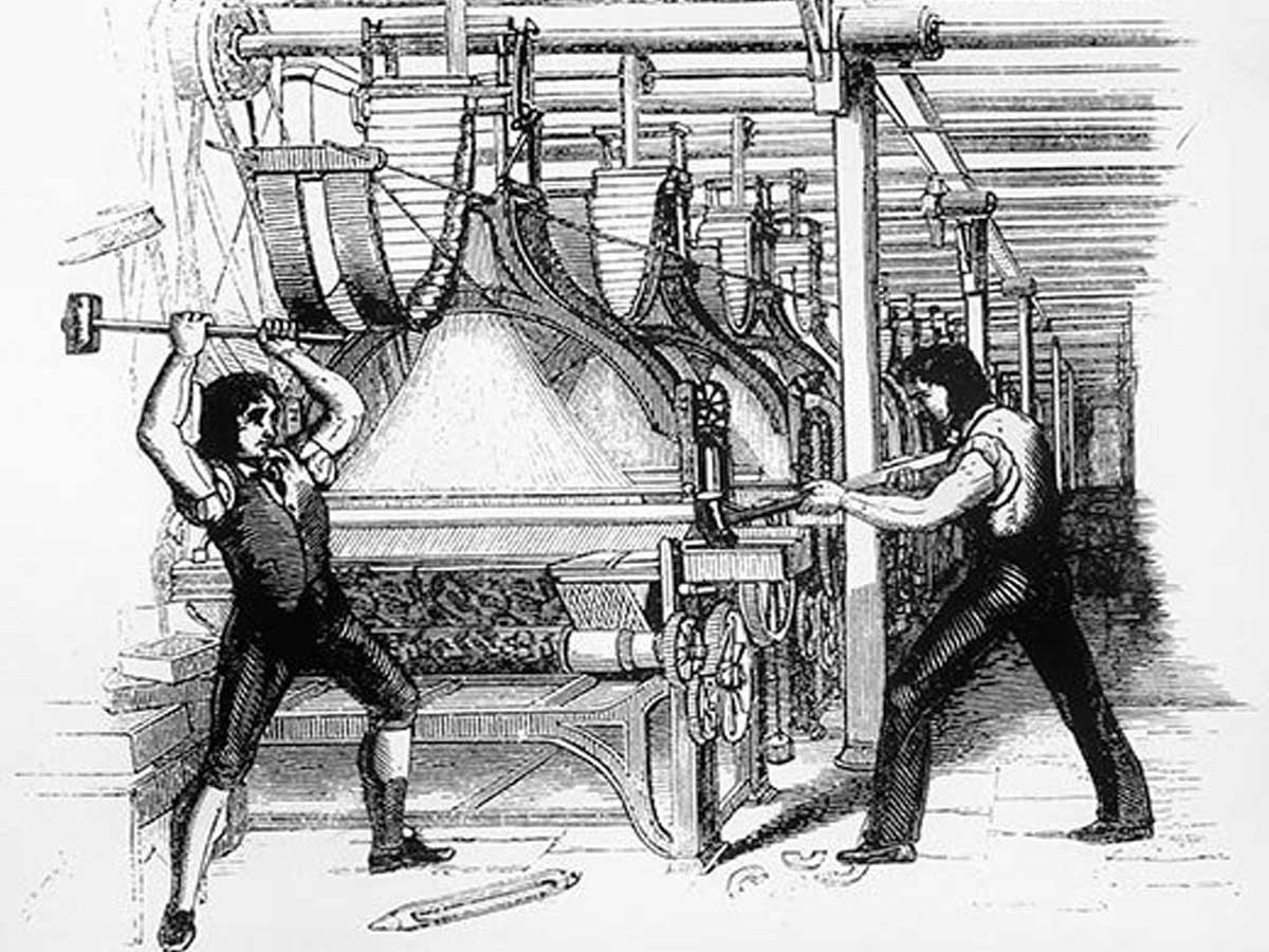 The Luddites, shown here hammering away in a textile mill in 1812, were not the first protesters to smash technology. And many were skilled at using machines.